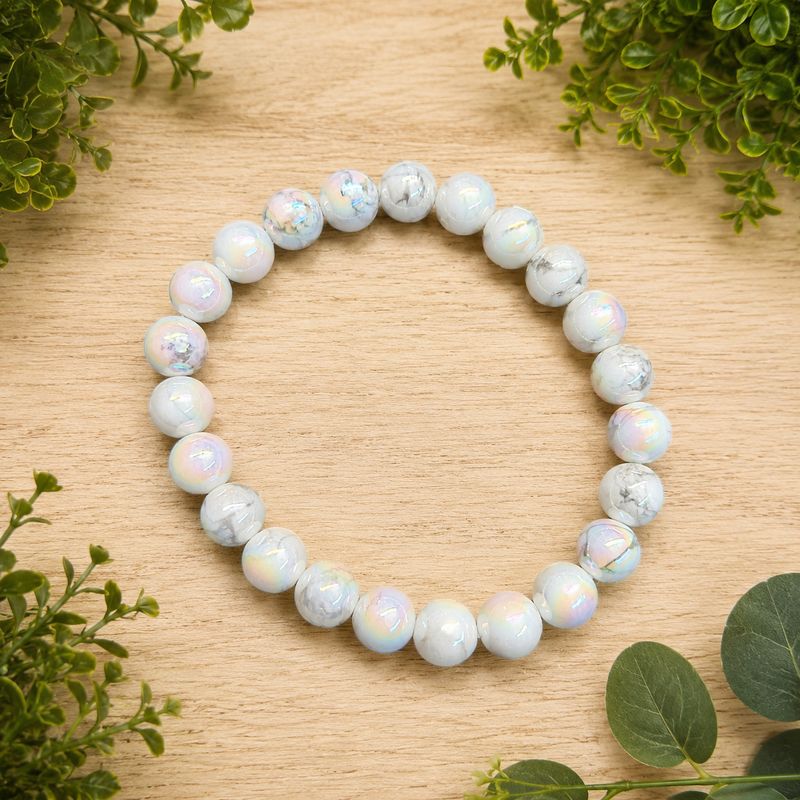 Angel Aura Howlite 8mm bracelet with white veined beads and an iridescent rainbow finish.