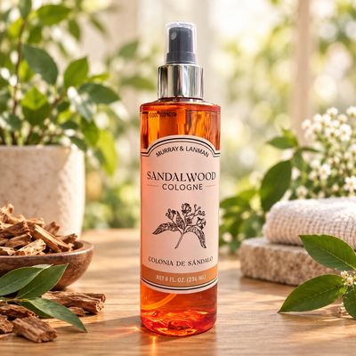 Murray &amp; Lanman Sandalwood Cologne 8 oz displayed on a light wooden table with greenery.