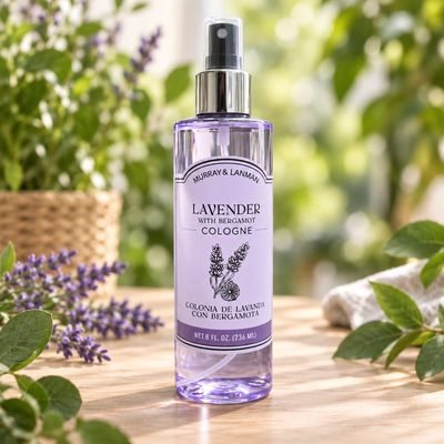 Murray &amp; Lanman Lavender with Bergamot Cologne 8 oz on a light wooden table with greenery and lavender.