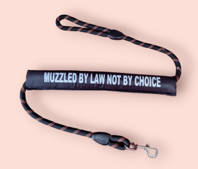 Muzzled by law not by choice, lead sleeve