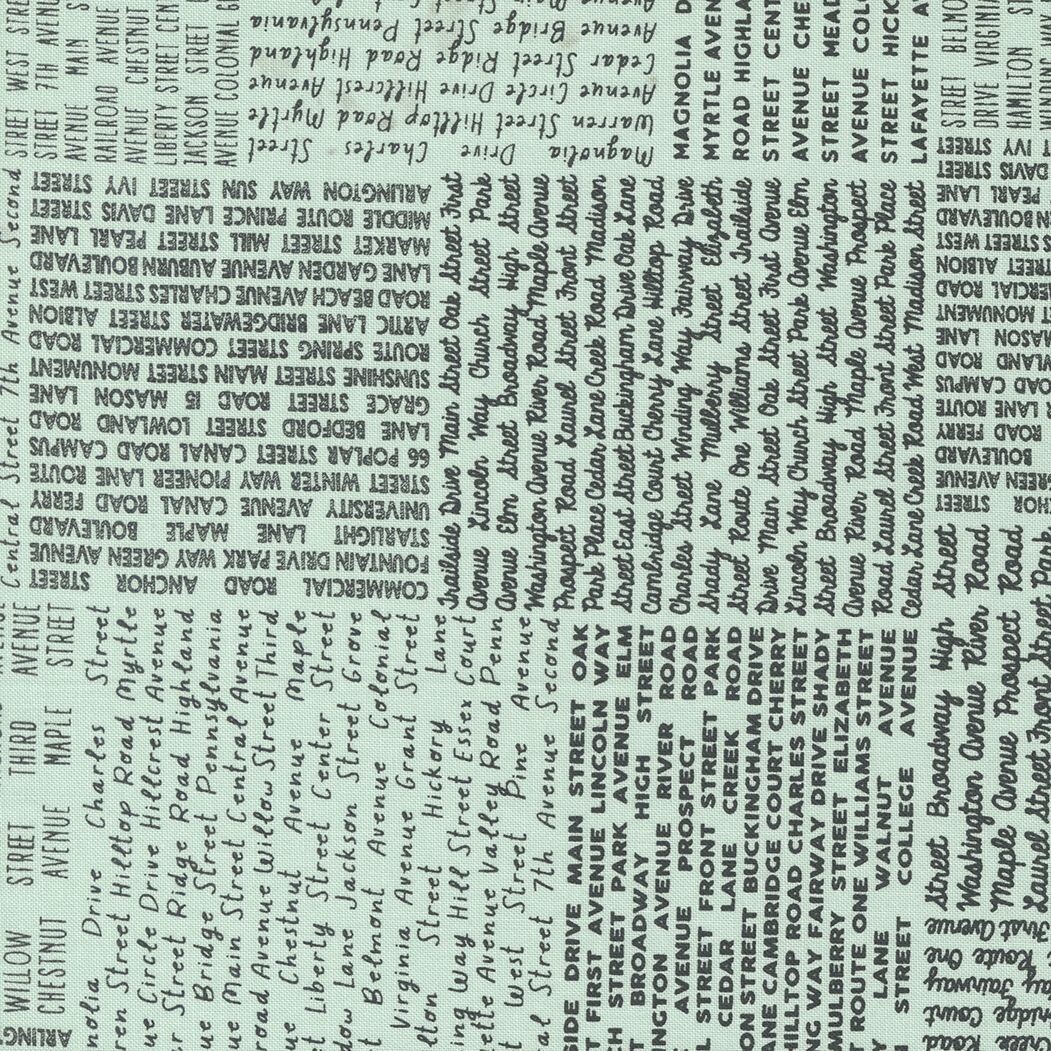 Patchworkstoff "In The News Text and Words" Straßennamen aus New York, Schrift, türkis, schwarz, 21,50€/m*