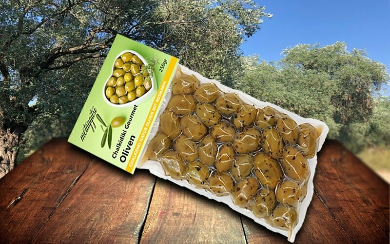 Grüne Oliven, mariniert 
mit Rosmarin, 500 g Vakuumpack