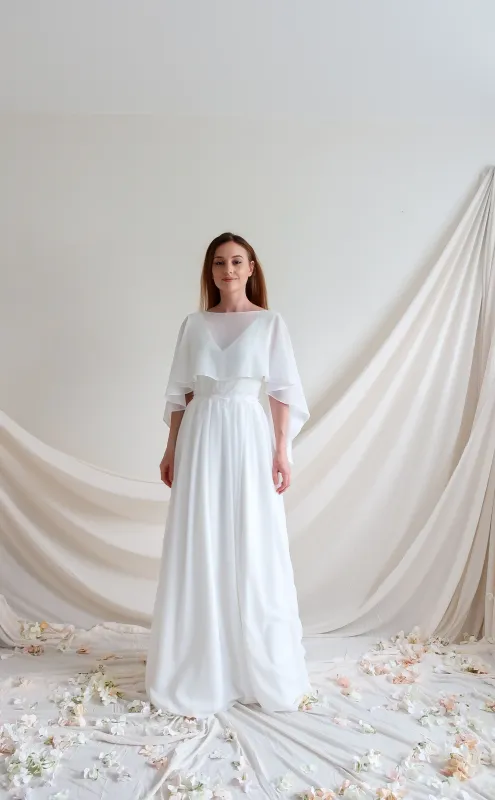 Cape en Mousseline pour Mariée – Élégance Légère et Moderne texture en mousseline de la cape de mariée élégante et légère, cache-épaule mariage