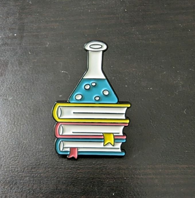 Erlenmeyer flask on books Lapel Pin