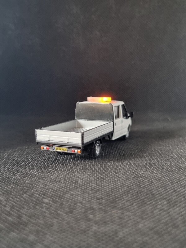 76TPU005 - Ford Transit Dropside White with Leigh Models and Hobbies Light Series Lights