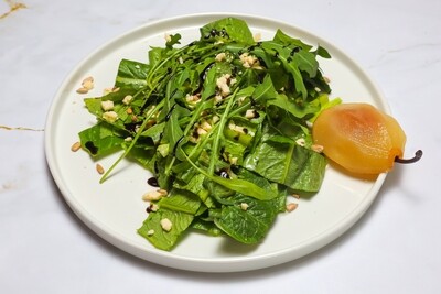 Rucola, goat cheese and poached pear salad