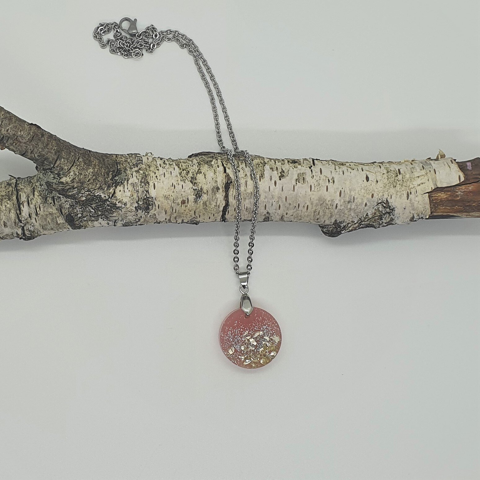 Halskette Schmuck aus Kunstharz rosa silber rund