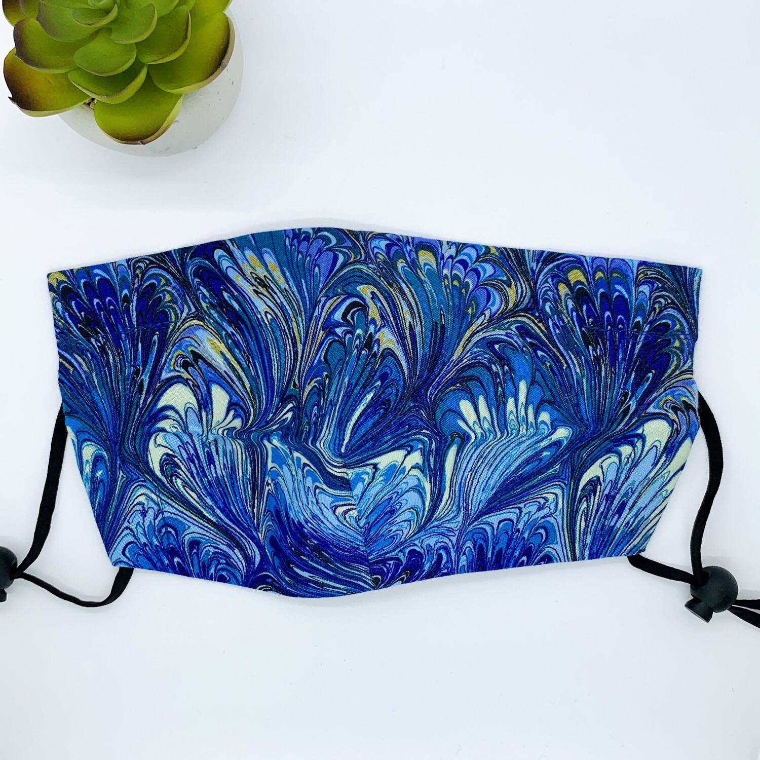 Facemask, Peacock tail