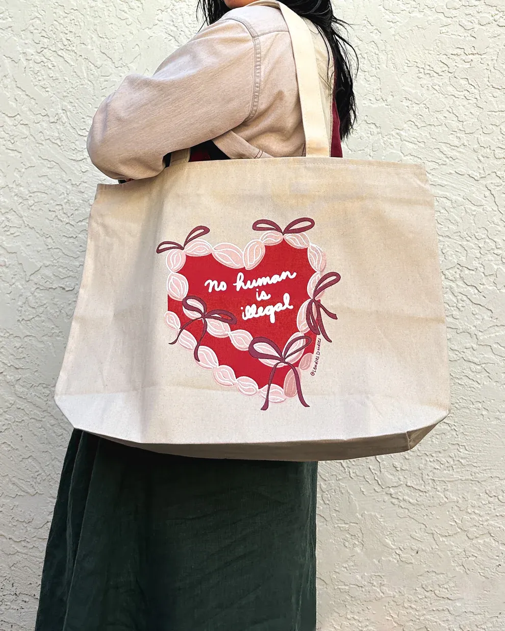 No Human is Illegal Cake Tote Bag