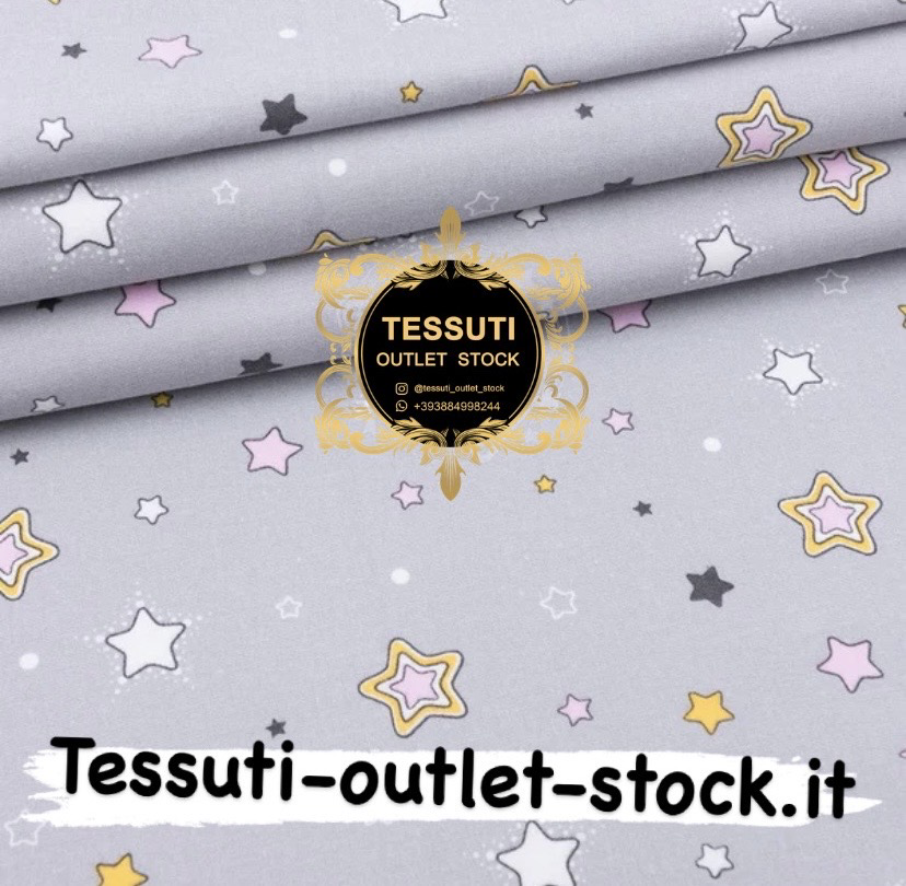 Flanella fantasia stelle  su sfondo grigio chiaro , larghezza 240 cm