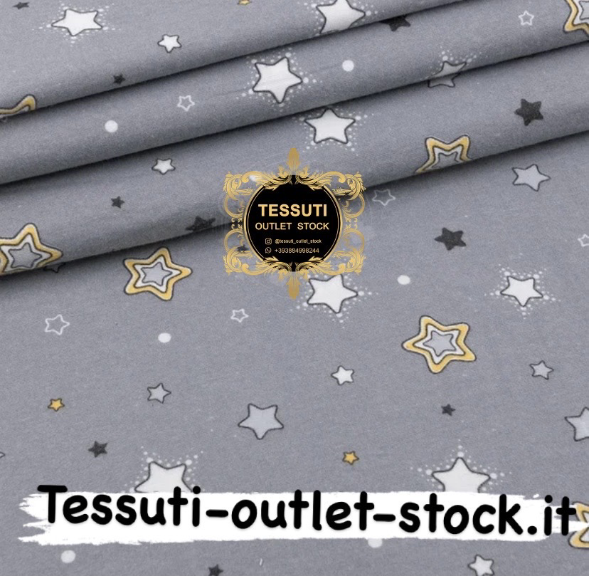 Flanella fantasia stelle  su sfondo grigio , larghezza 240 cm