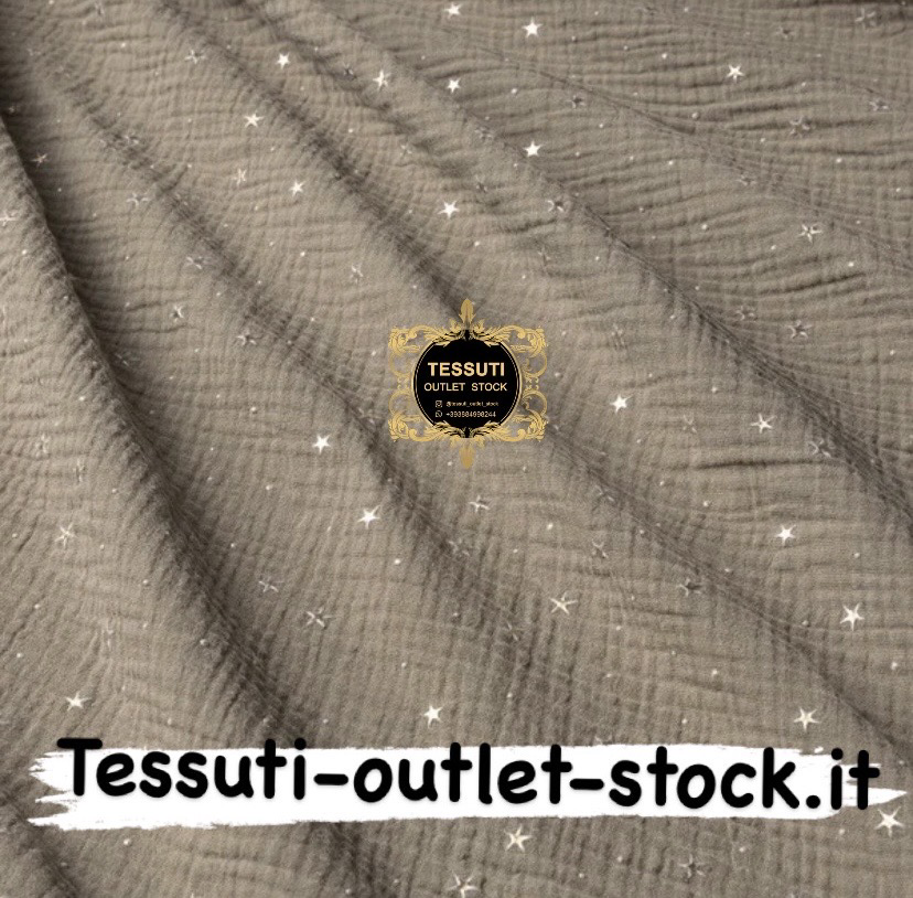 Mussola doppia garza con stelle dorate su fondo khaki , larghezza 135 cm МС-D-0266