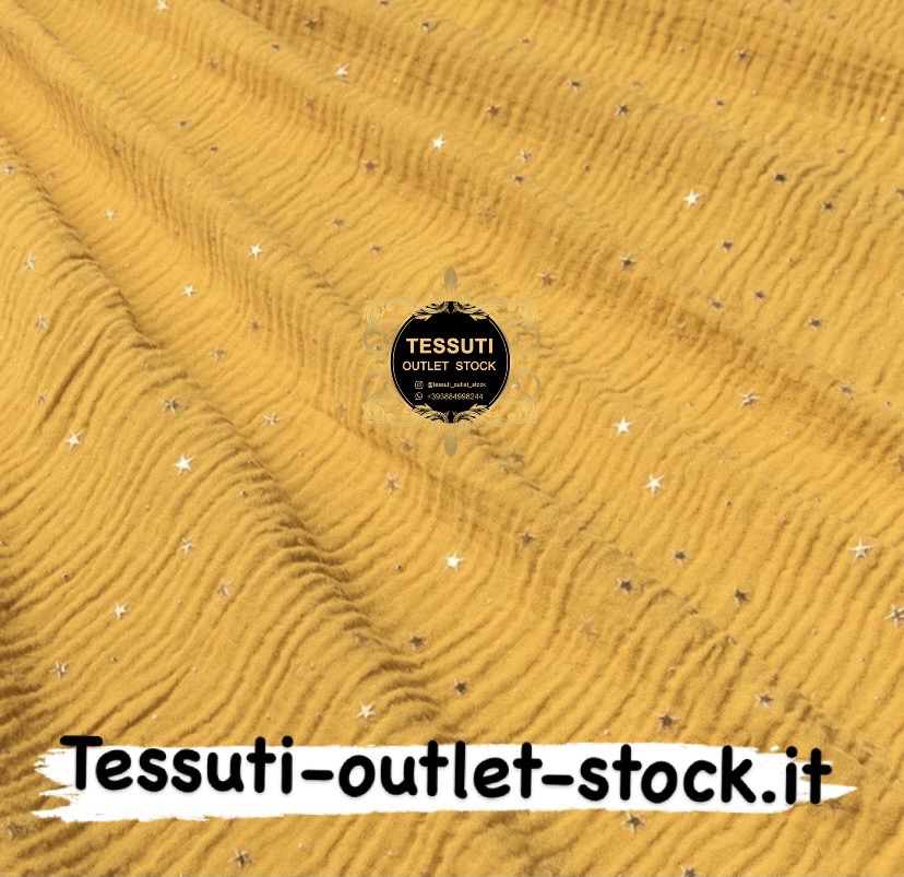Mussola doppia garza con stelle dorate su fondo senape, larghezza 135 cm МС-D-0261