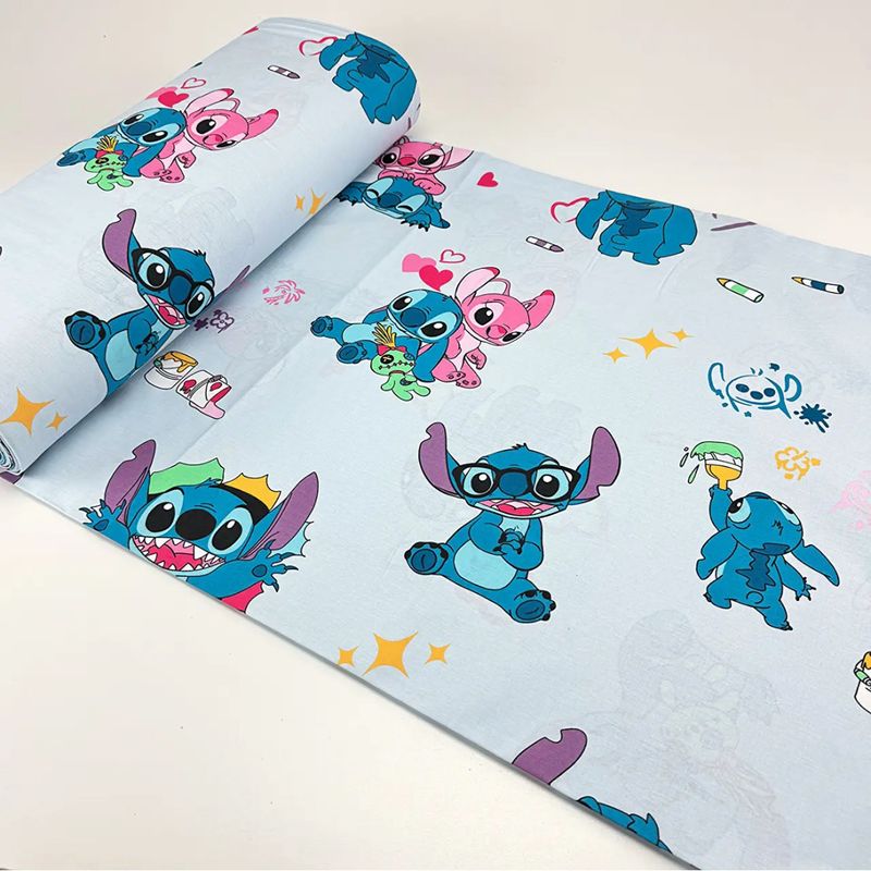 Tessuto di Cotone h240cm “Stitch e Angel” su sfondo azzurro 