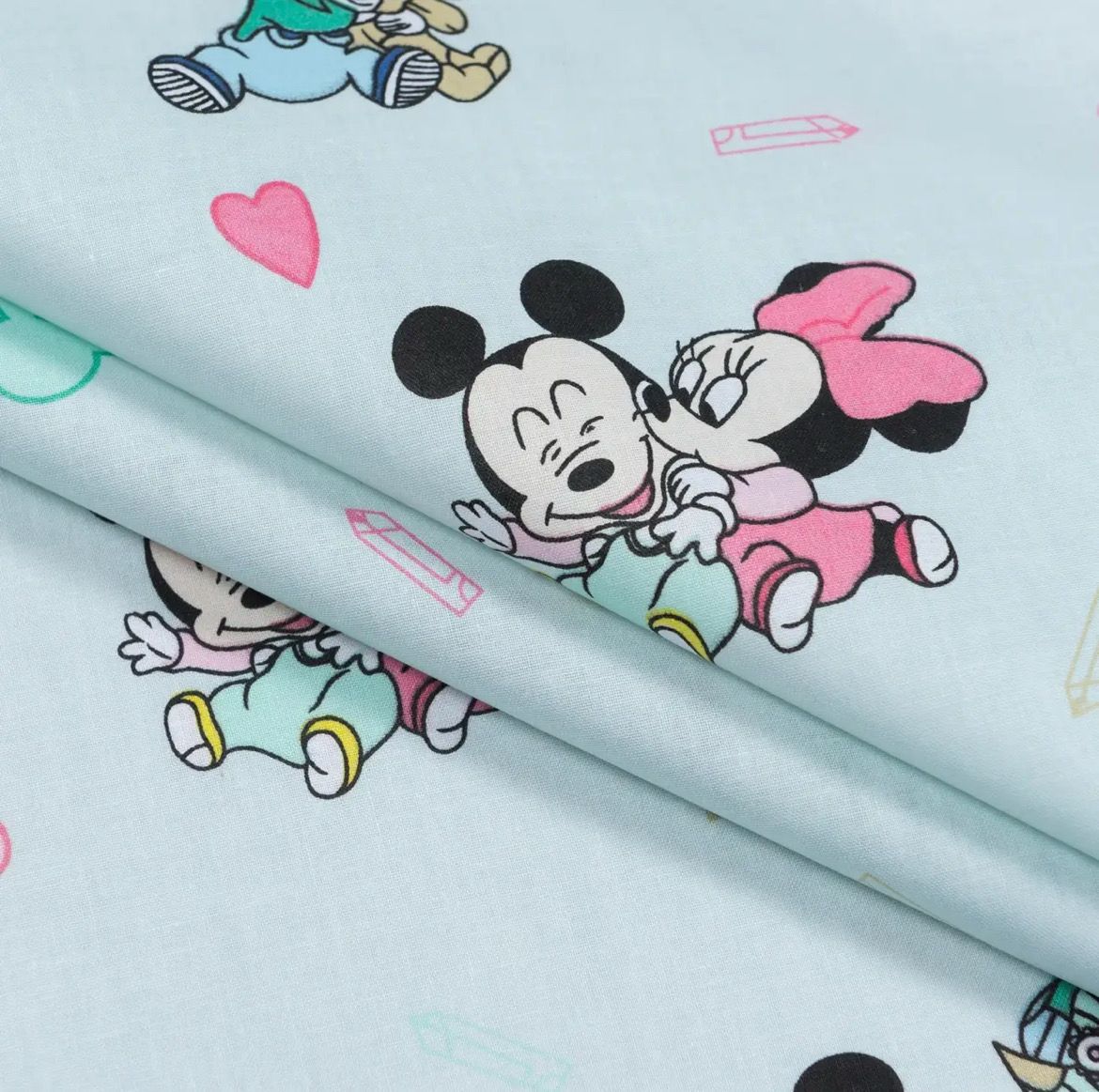 Tessuto di Cotone 220cm “Minnie Mouse “ Sfondo Menta