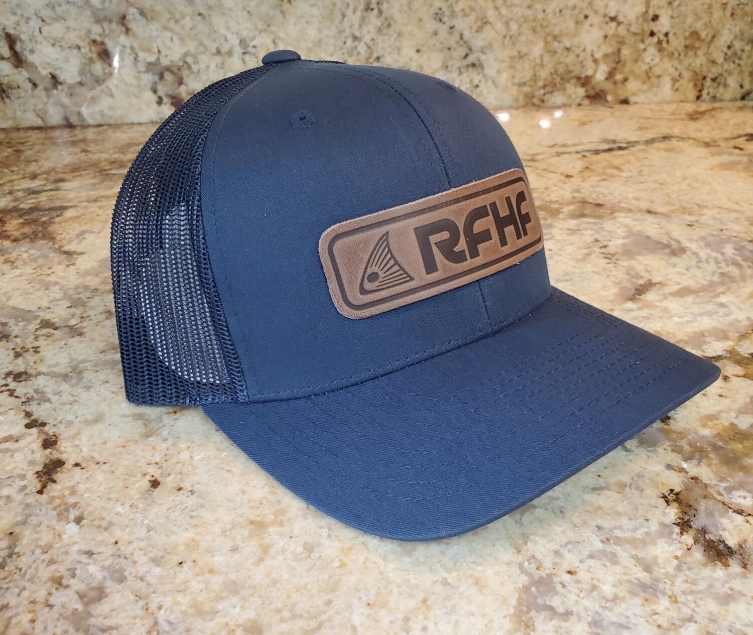 Leather redfish patch/navy hat