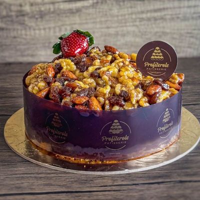 a dairy free cake with dried nuts on top