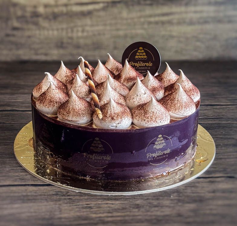a tiramisu cake with tiramisu cream on top