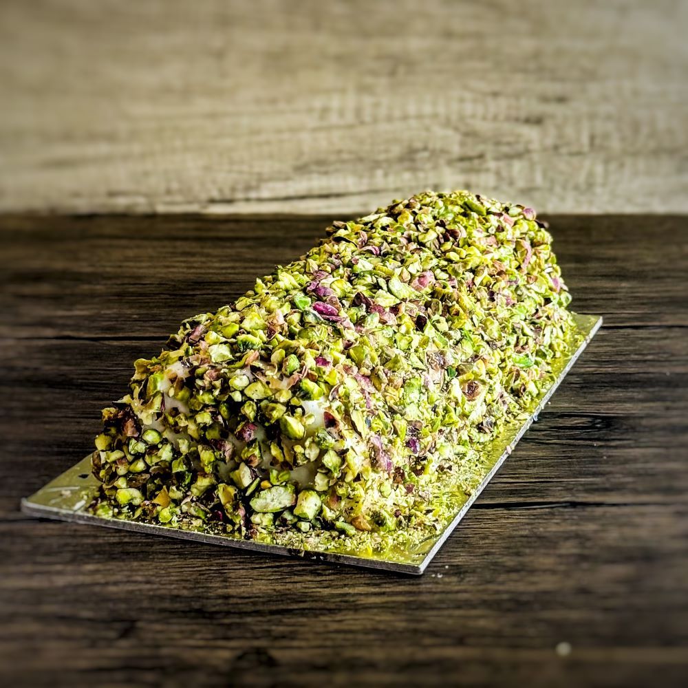 an Ashta ice cream covered with pistachio