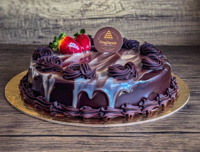 a marble mud cake with chocolate ganache on top