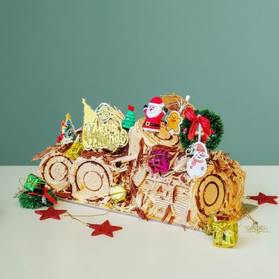 a belgium chocolate christmas cake with christmas decorations