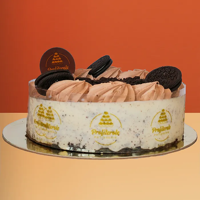 Oreo Cheesecake Oreo cheesecake with chocolate mousse, crushed Oreo crumbles, and whole cookies on a creamy base by Profiterole Patisserie