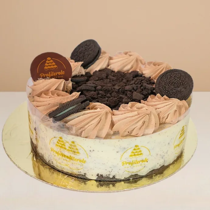 oreo cheesecake from the side showing its base made from crushed cookies infused in cream cheese filling