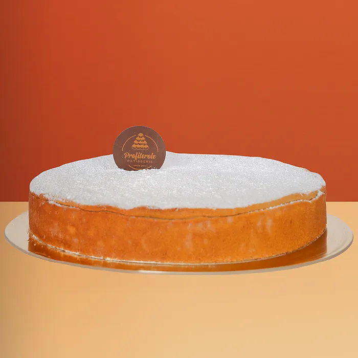 Baked Ricotta Cheesecake Baked ricotta Nutella cheesecake with powdered sugar on a gold board