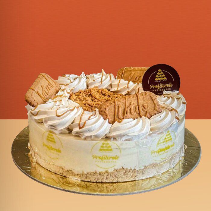 Lotus Biscoff Cheesecake Lotus Biscoff cheesecake with cream piping, cookie crumble, and caramel drizzle