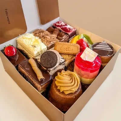 a box of slices of deluxe cake flavours from profiterole patisserie - option for 8, 10, or 12-piece box