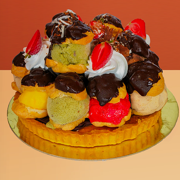 Profiterole ice cream cake with 14 chocolate-glazed profiteroles, mixed gelato & strawberries by Profiterole Patisserie