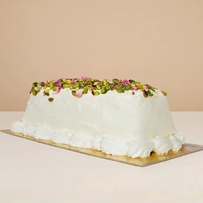 ashta ice cream cake topped with bits of pistachio
