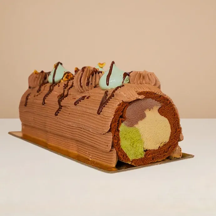 chocolate swiss roll ice cream cake, at the center are its gelato filling