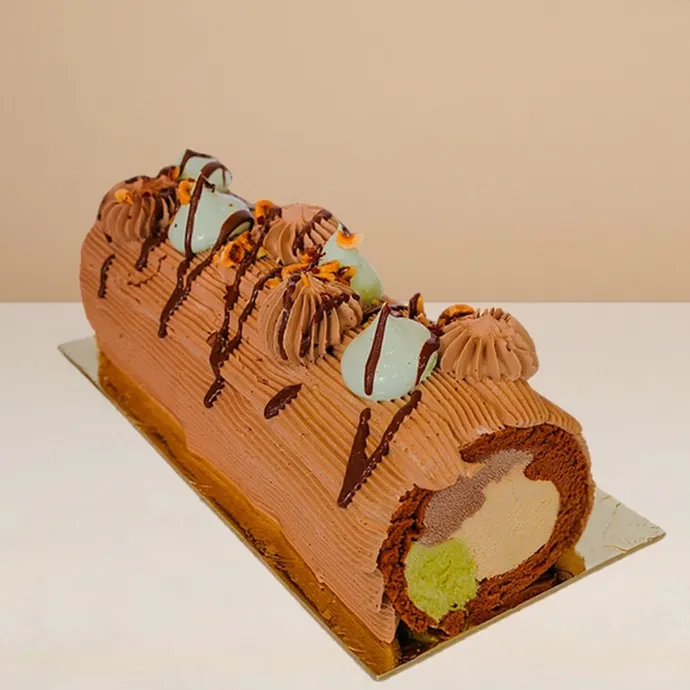 chocolate swiss roll ice cream cake, at the center are its gelato filling