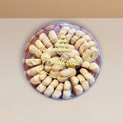 shortbread cookies beautifully arranged inside a clear tub