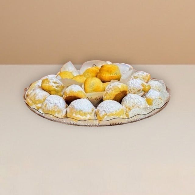 maamoul cookies arranged on a clear plate