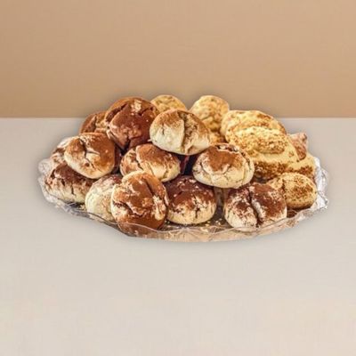 vegan cookies stacked on a clear plate