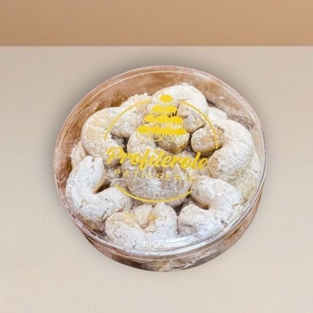 almond biscuits inside a clear tub