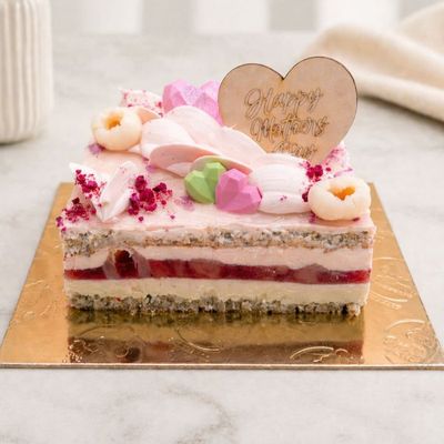 Mother’s Day strawberry lychee blossom cake with pink frosting, layered almond sponge, strawberry and lychee filling