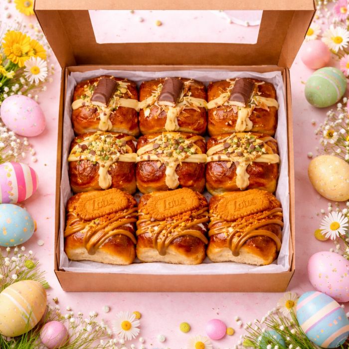 Box of 9 Easter brioche hot cross buns filled with pistachio, Bueno hazelnut chocolate, and Lotus Biscoff spread