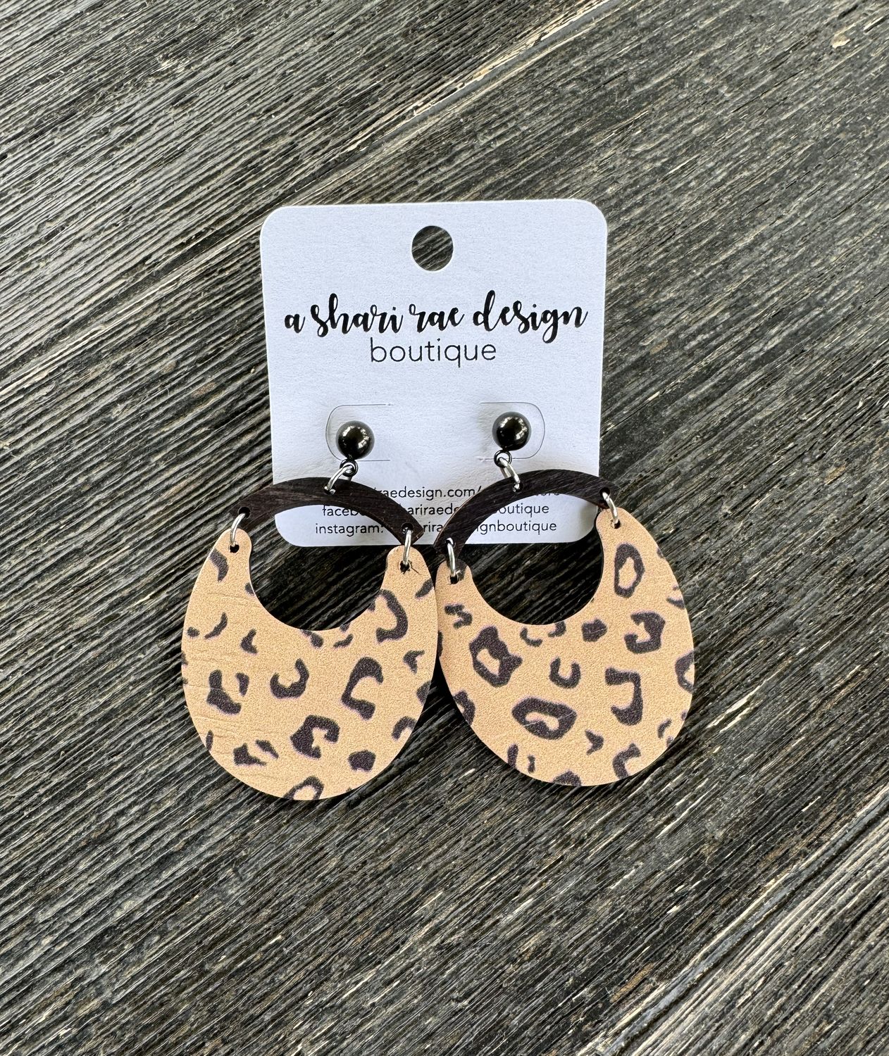 Leopard Oval Cutouts Black Arch Bar Studs