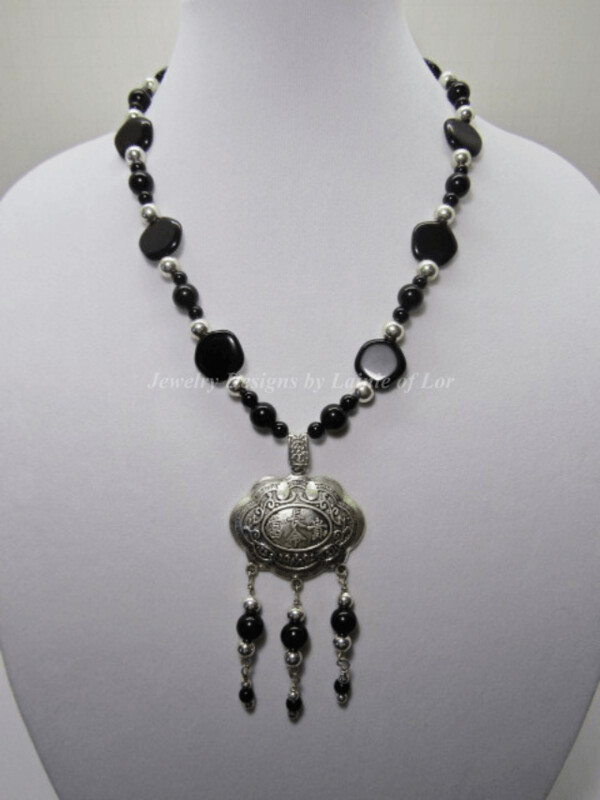 Black Onyx and Silver with 3 1/2 inch drop Pendant