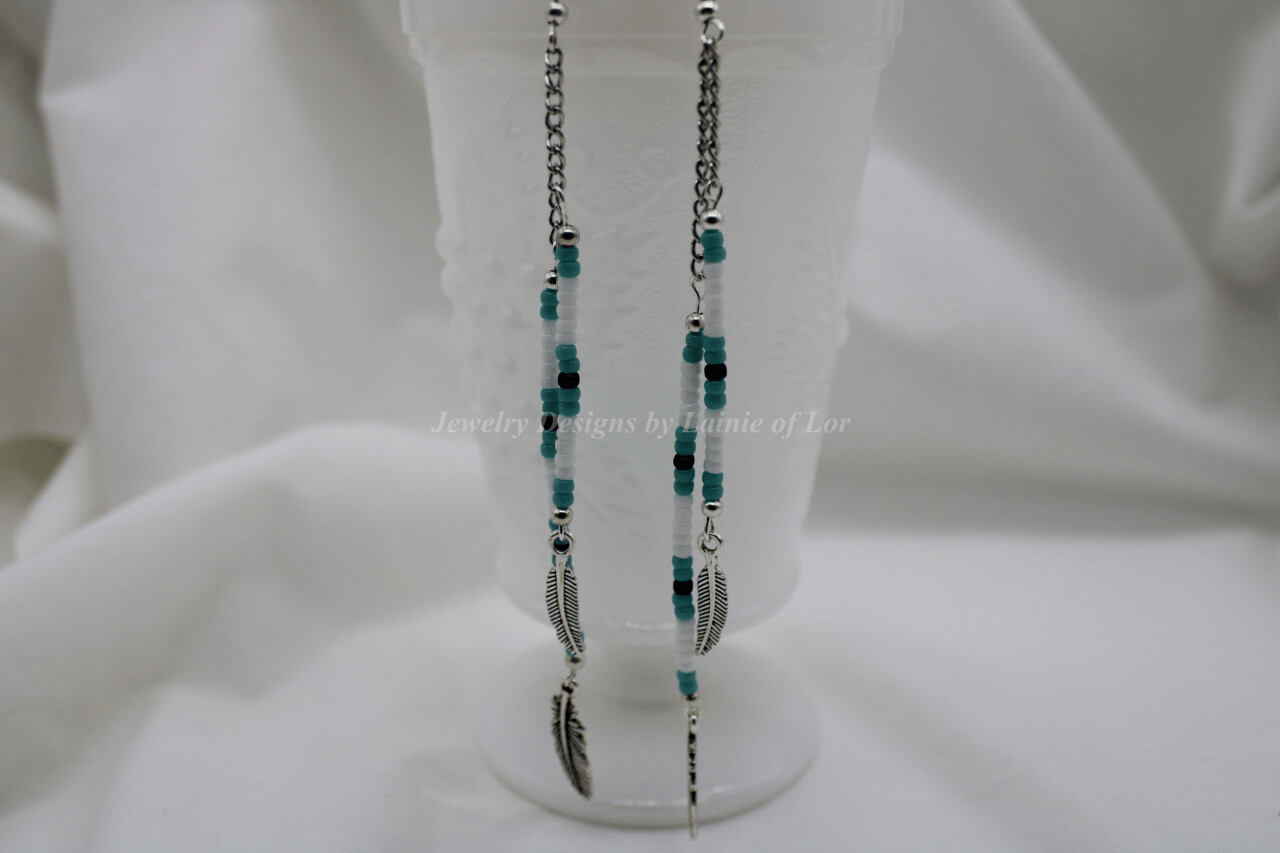 Turquoise, White, and Black Seed Beads and Feathers Earrings in Silver Tone