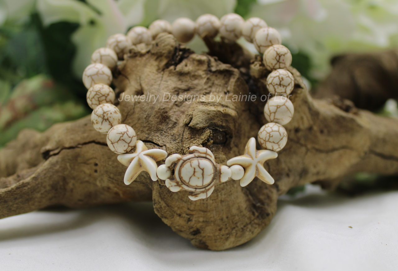 White Magnesite Rounds and  Howlite Turtles and Starfish Stretch Bracelet
