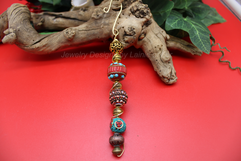 Wire Wrapped Turquoise and Coral Ornament in Gold Tone