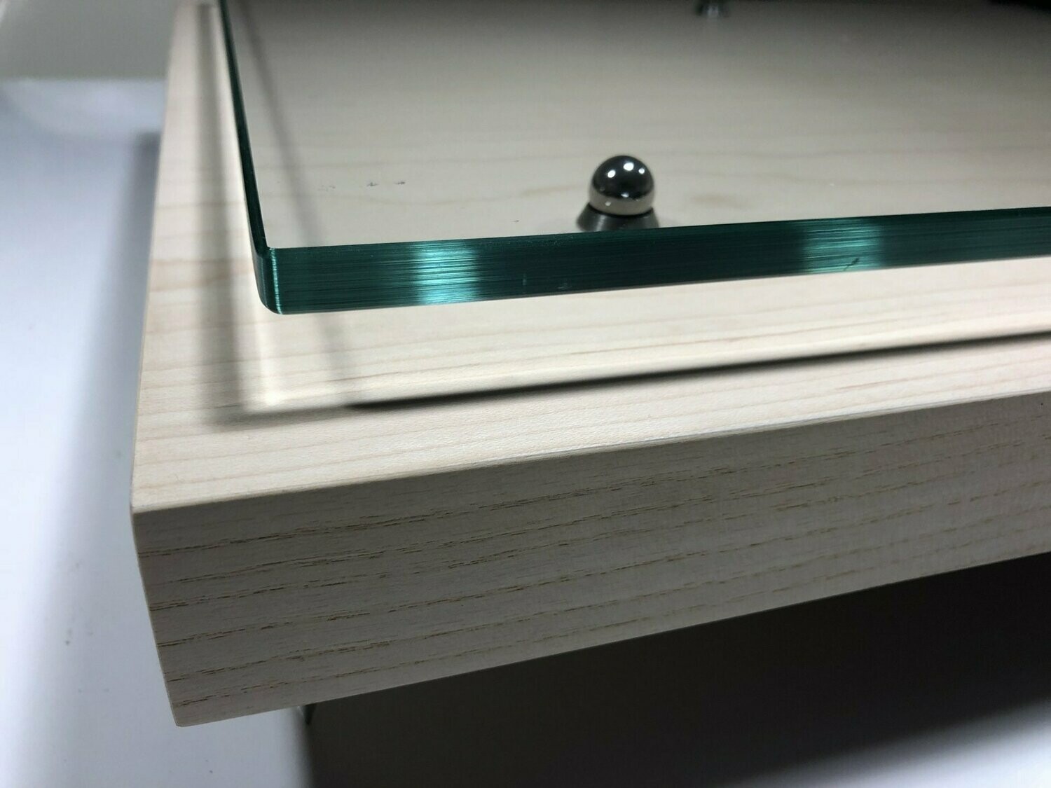 40mm levelling plinth with 10mm CNC finished isolation glass shelf
