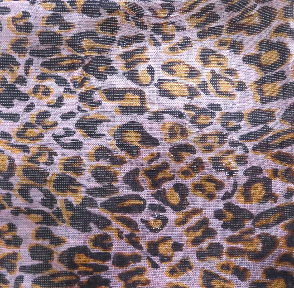 Light pink background animal print tichel