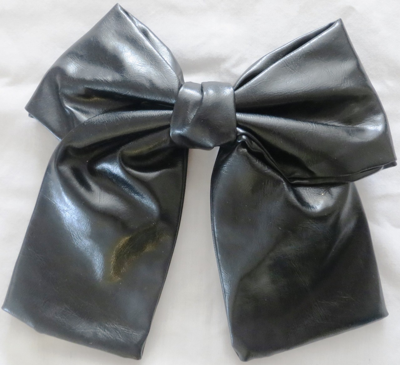 Black large faux leather bow