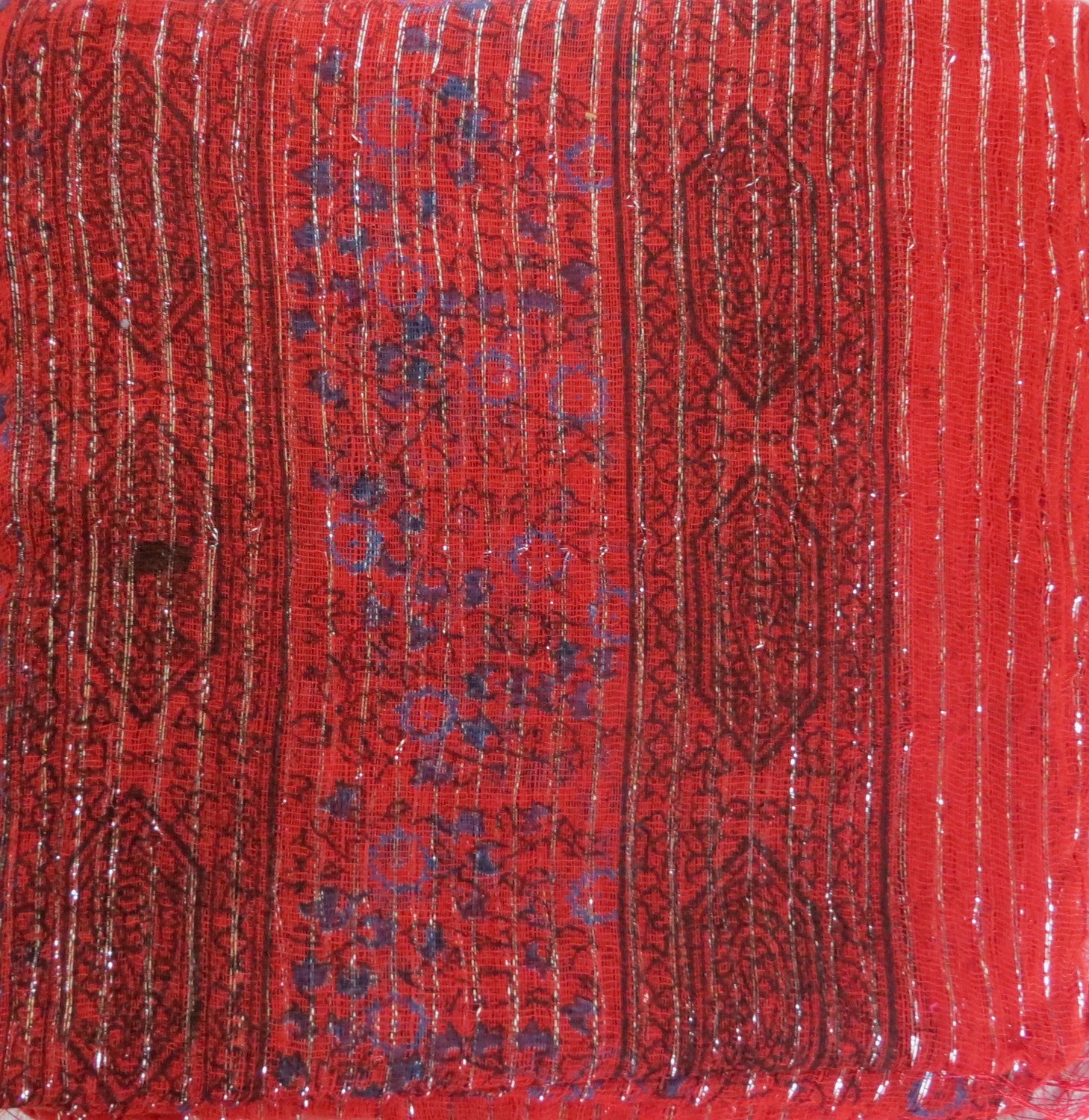 Red lurex tichel with blue berry flowers