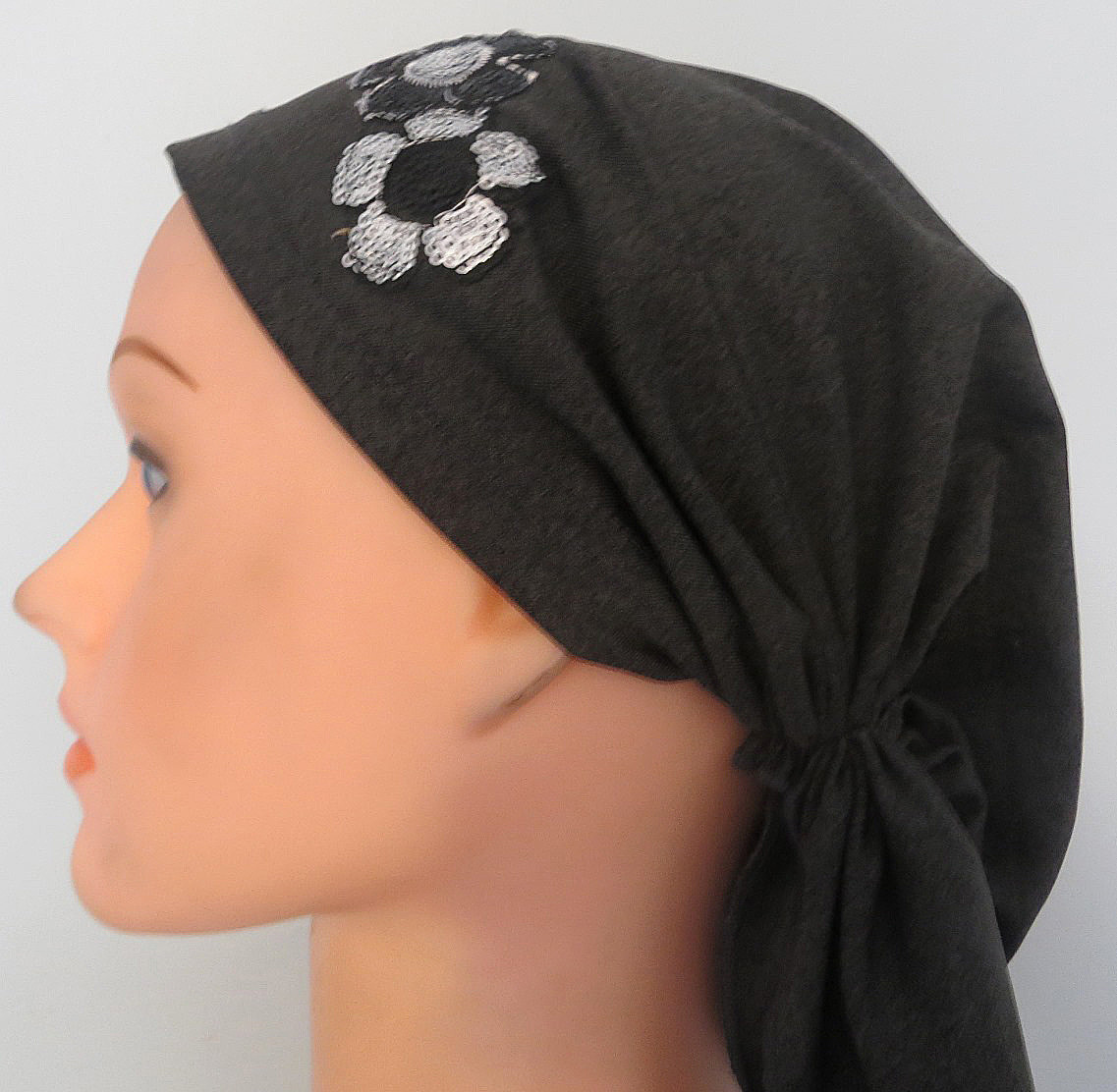 Gray pretied tichel with pretty double flower applique
